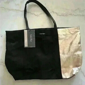 Authentic Calvin Klein Black Gold Lined Canvas Tote Limited edition NWT.
